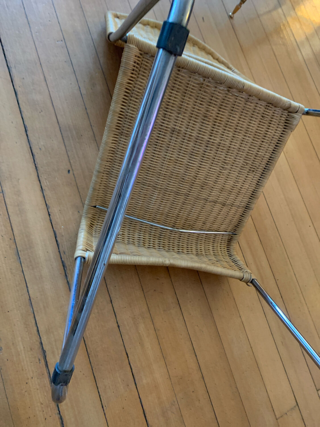 Vintage wicker and chrome chair from the 1970s.