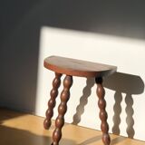 Turned wooden tripod stool