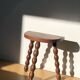 Turned wooden tripod stool