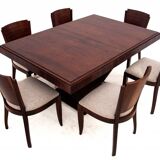 Original walnut extendable table, designed by Louis Majorelle, with 6 Art Deco chairs.