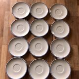 Set of 12 white porcelain saucers with blue edging