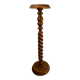 Antique pedestal table with a twisted column.