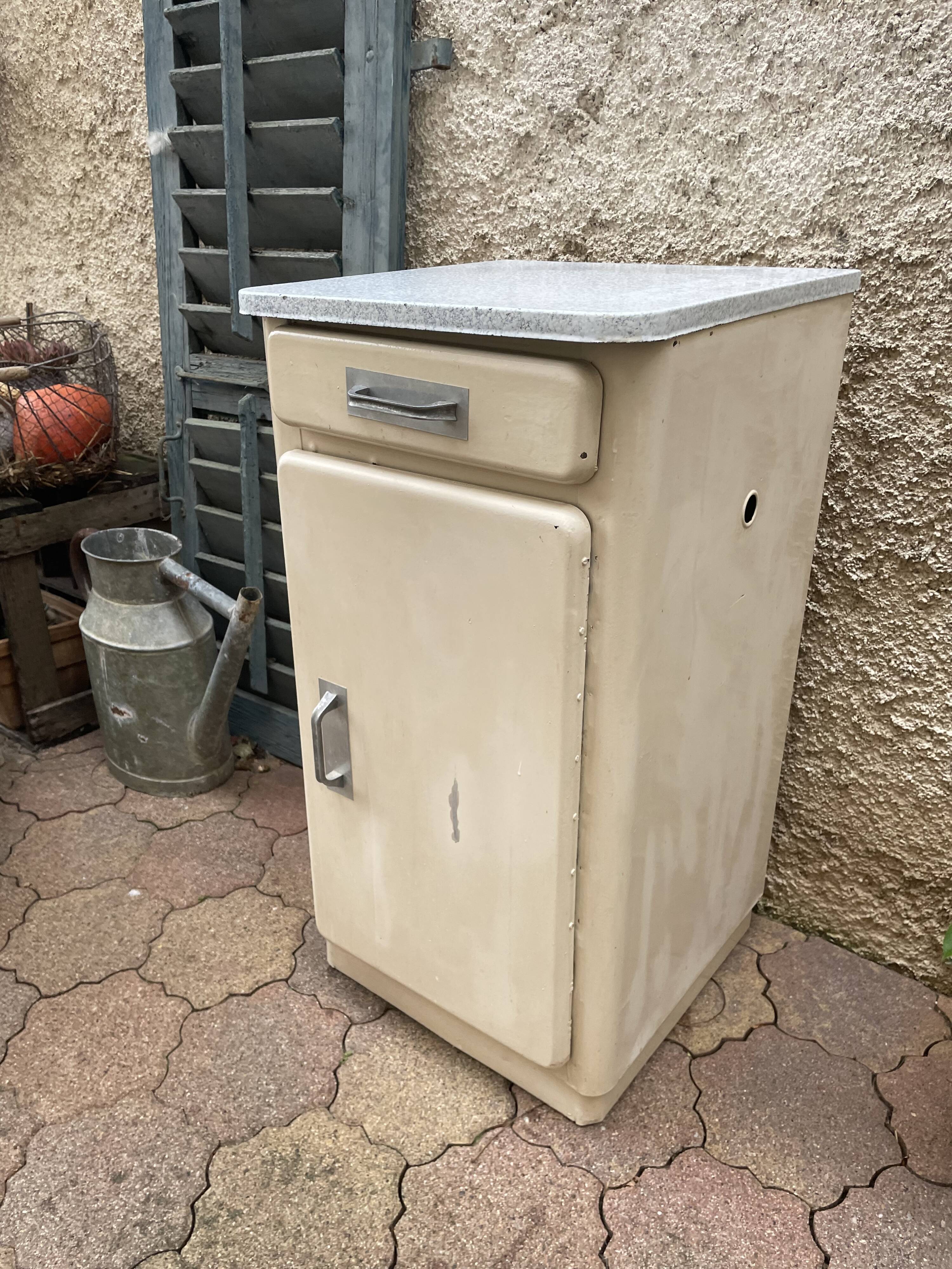 Furniture stored bottle in enamelled sheet metal