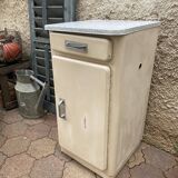 Furniture stored bottle in enamelled sheet metal