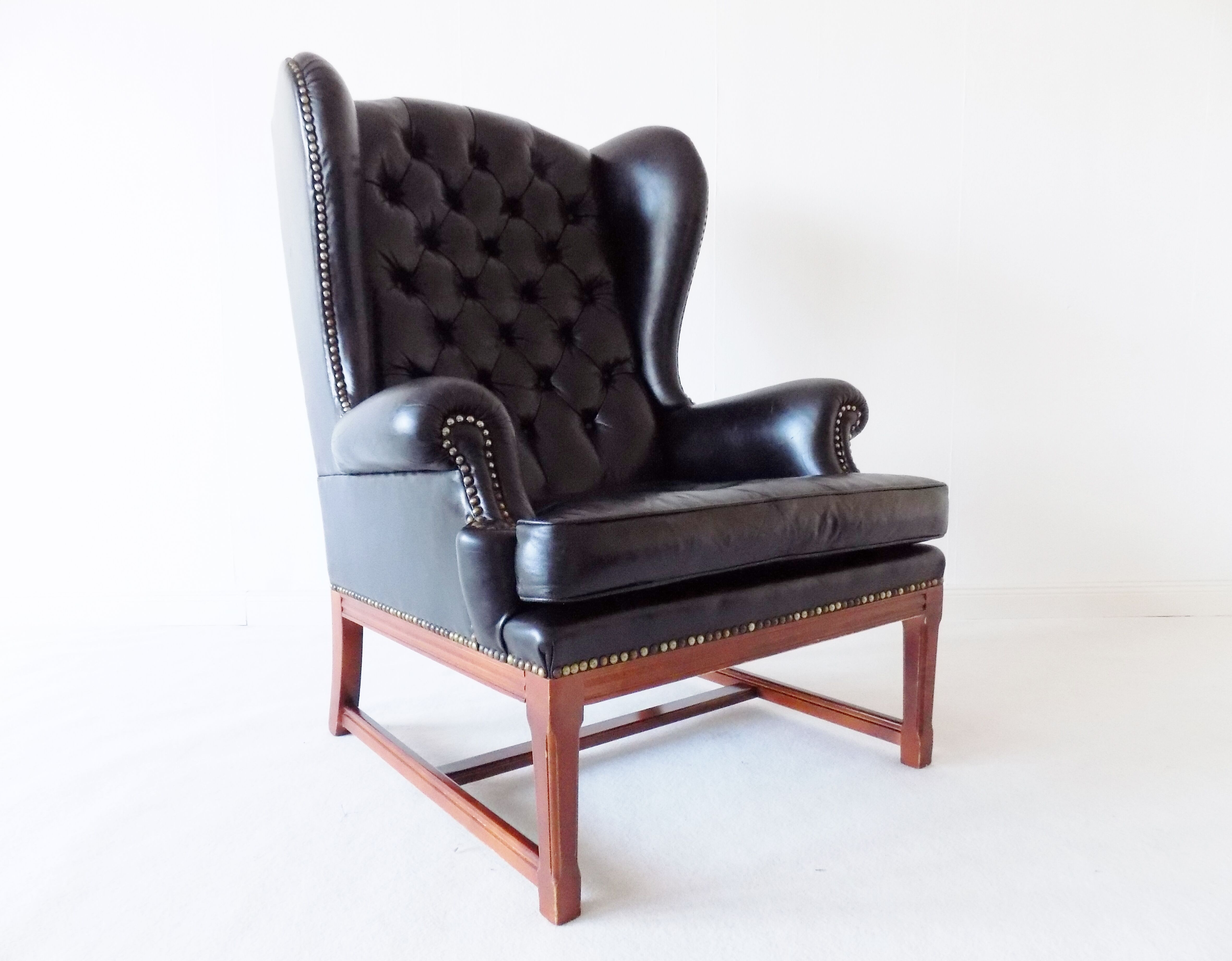 Chesterfield high back leather armchair black from the 1960s