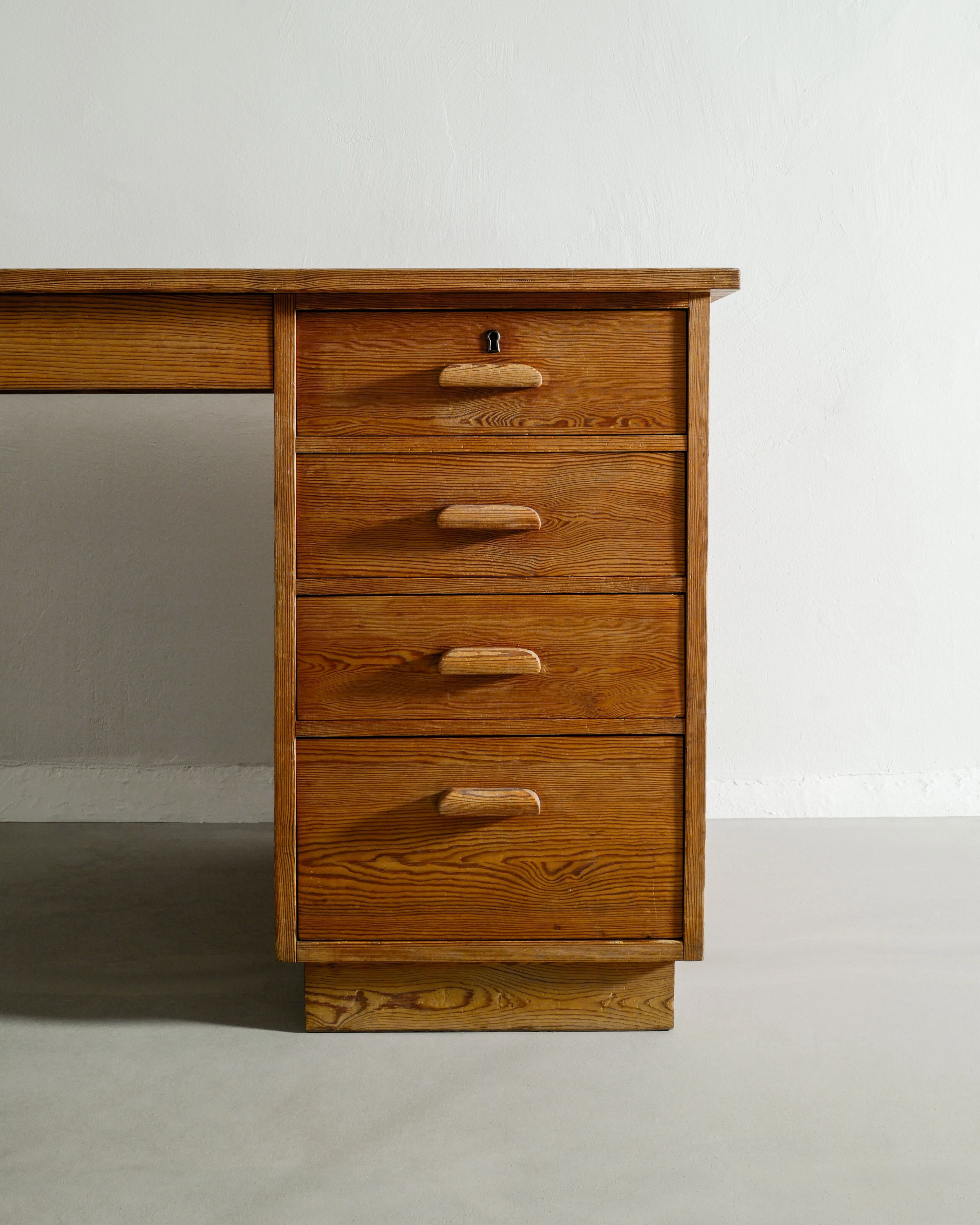 Swedish Wooden Pine Desk by Axel Einar Hjorth for Nordiska Kompaniet, 1930s
