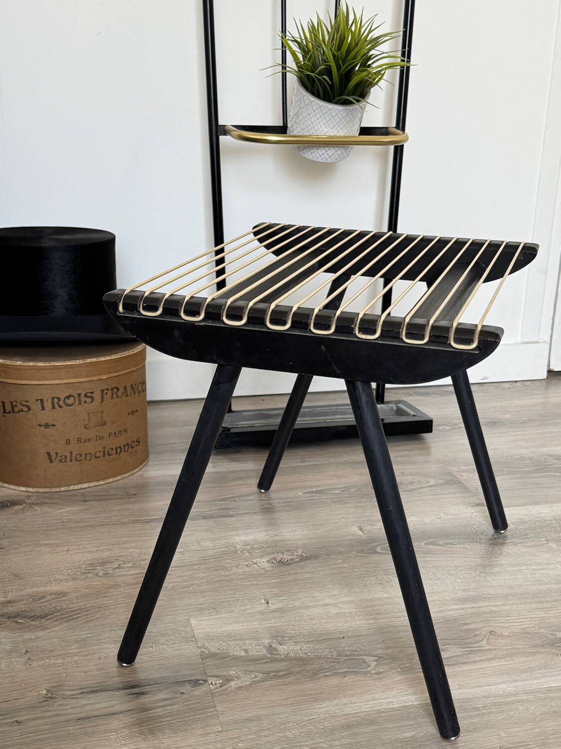 Vintage black Georges Tigien stool