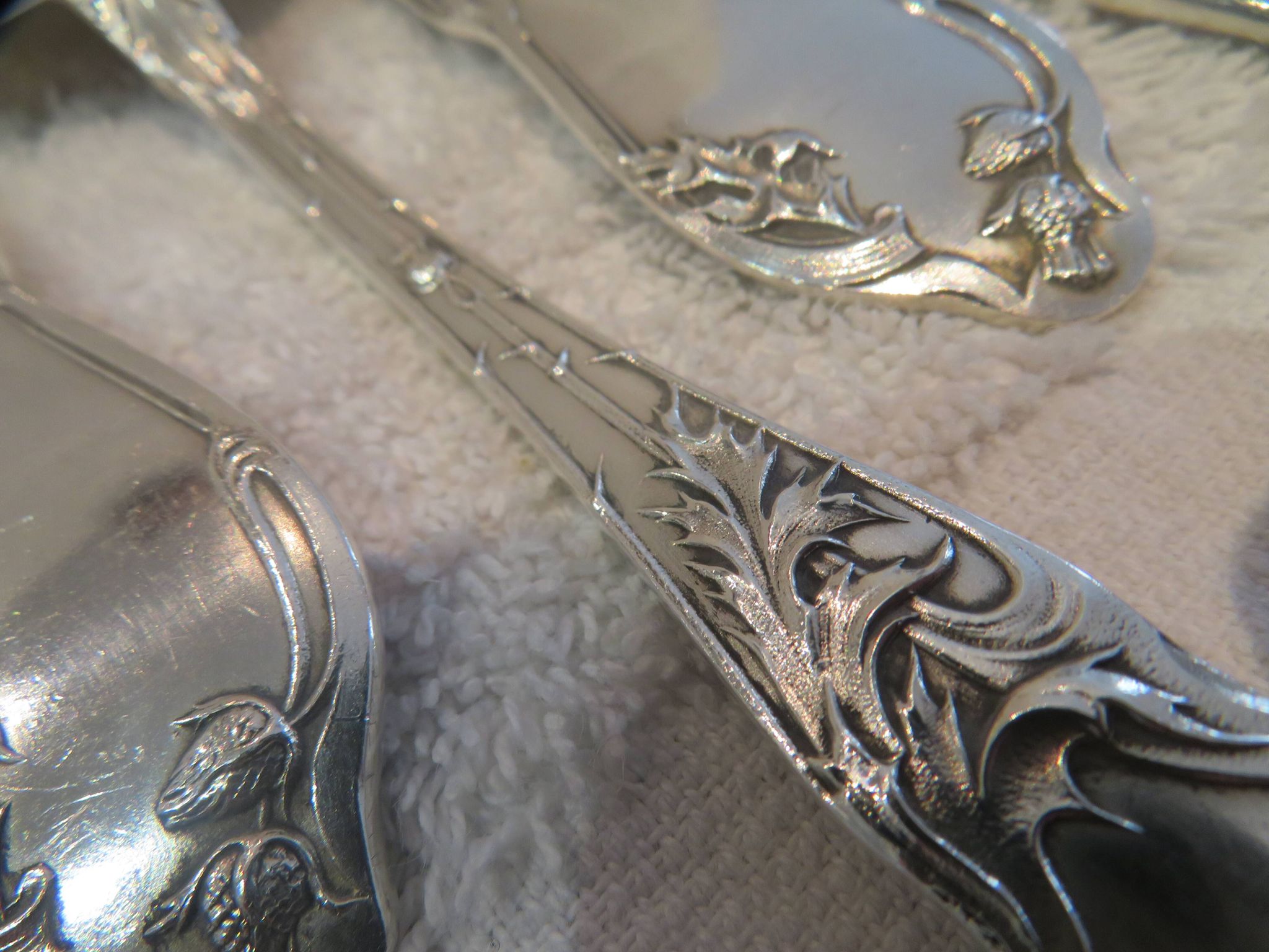 12 silver plated soup spoons by Boulenger, Art Nouveau Chardons