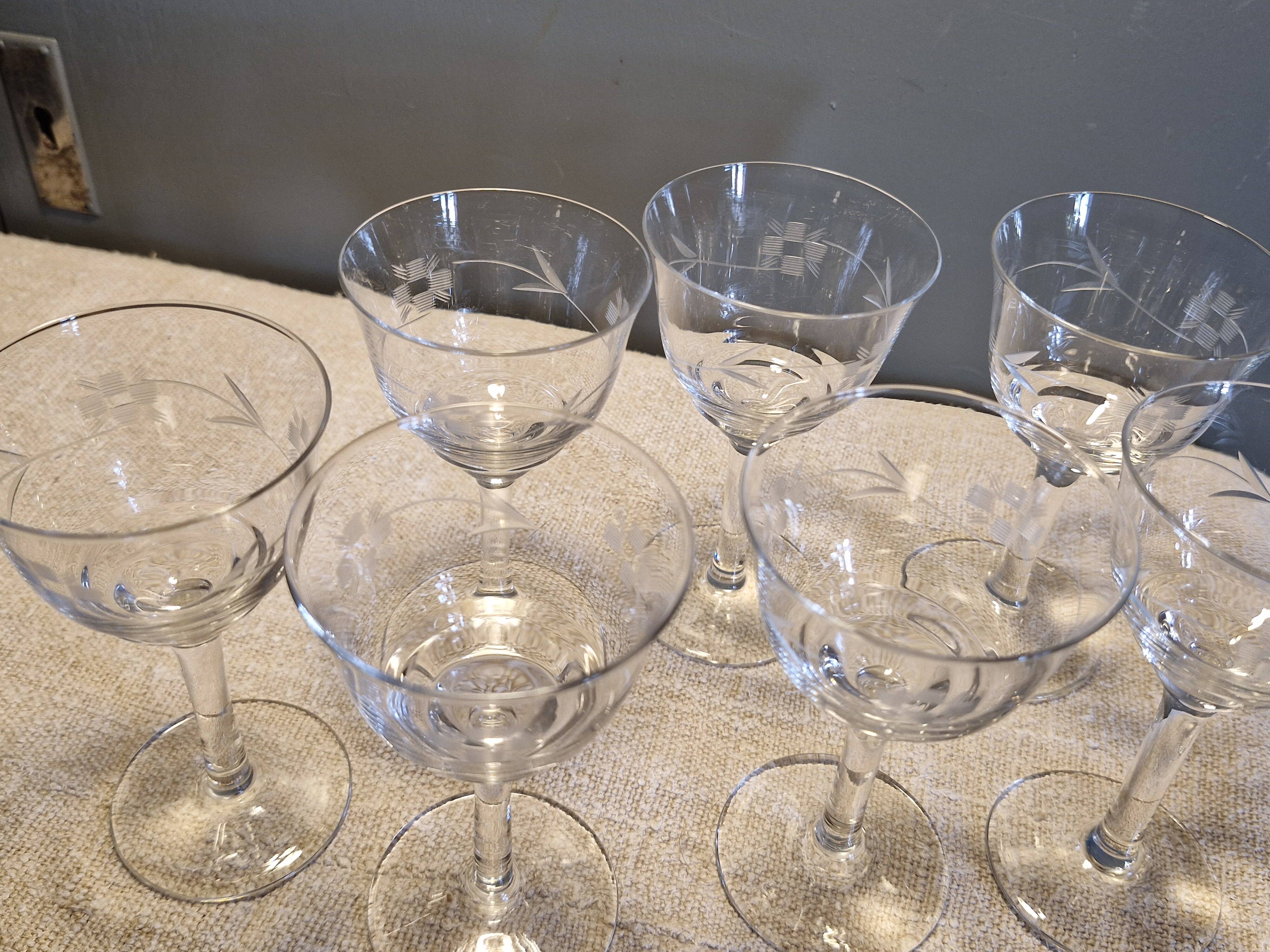 7 antique white wine/port glasses in crystal in excellent condition.