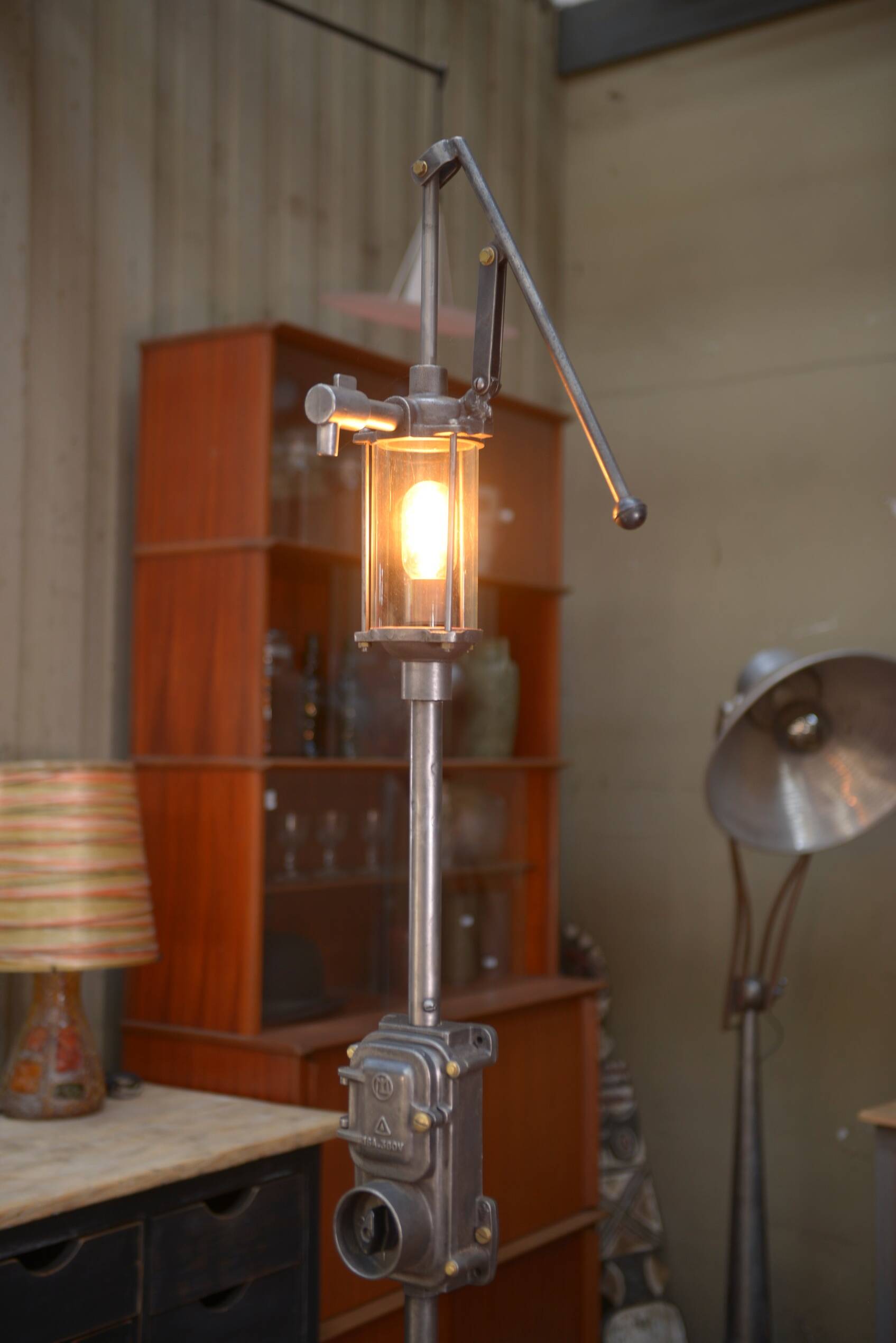 Old gas pump floor lamp in cast iron metal and glass 1930