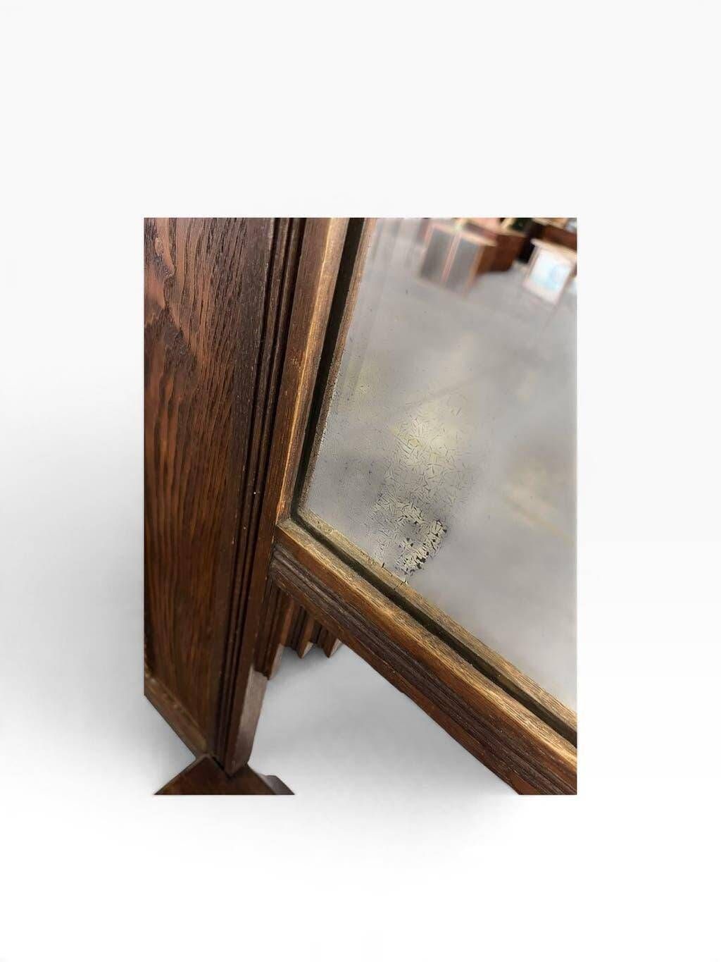 Vintage wooden coat rack with mirror.