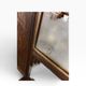 Vintage wooden coat rack with mirror.