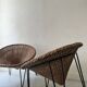 Italian sunflowers armchair in rattan and black metal, 1950s design.