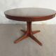 round/oval table with extension, central leg, dark shade, Baumann design