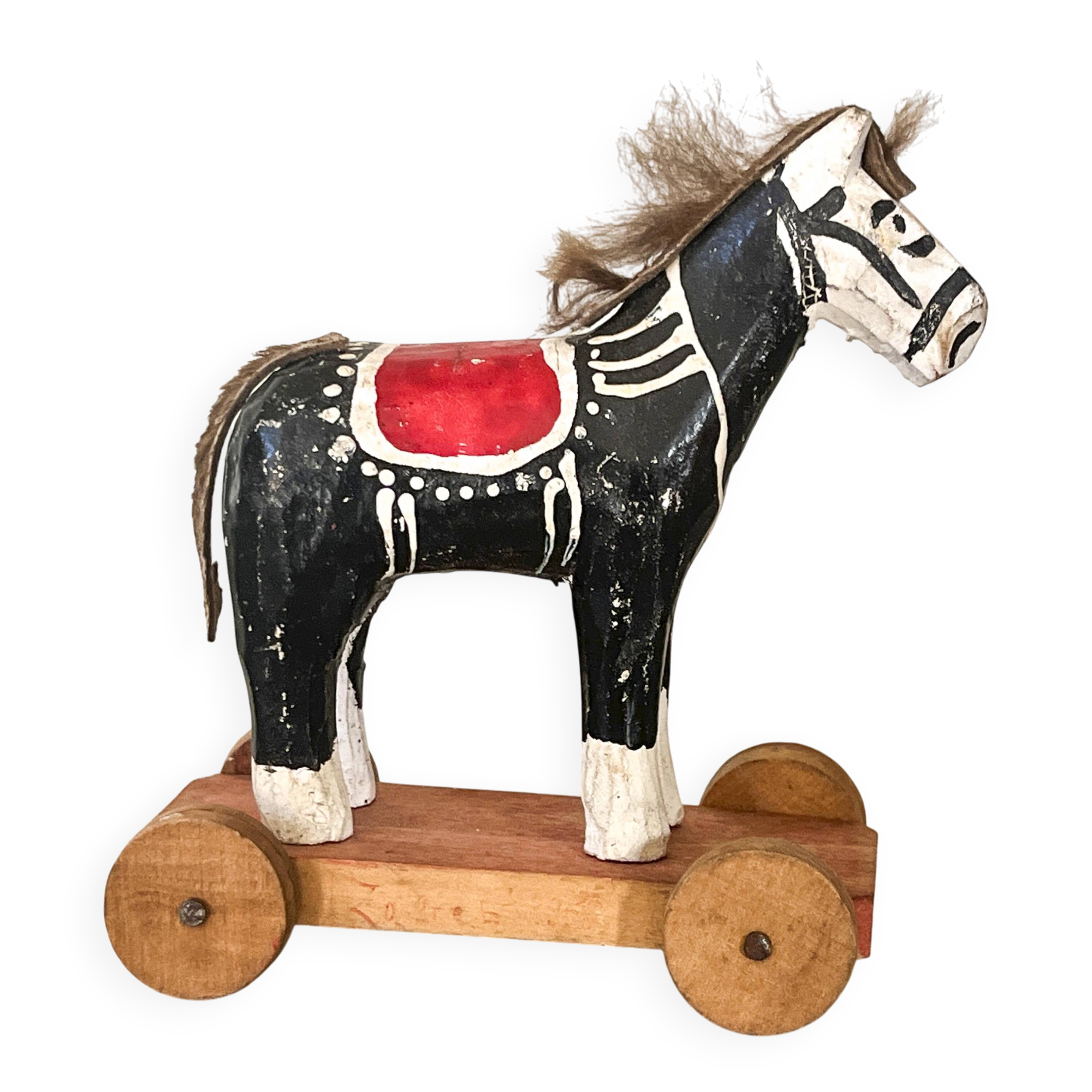 Old wooden pull-along toy, horse.