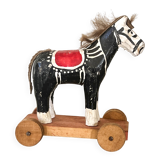 Old wooden pull-along toy, horse.