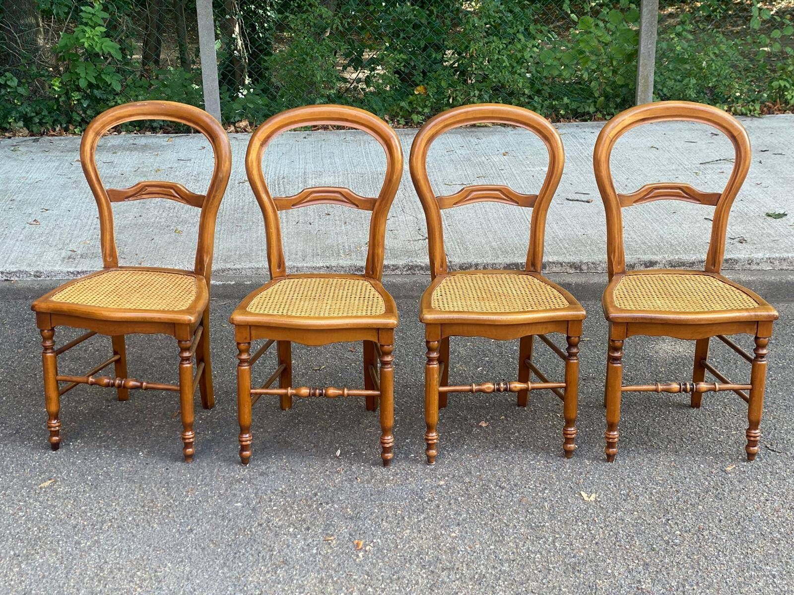 Set of 4 Louis-Philippe medallion chairs in wood with caned seats, 1970s.