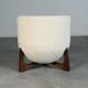 Totemo stool by forme, ivory dedar bouclé upholstery, walnut legs