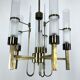 Lustre à cinq bras en laiton et tube de verre. Italie des années 1960, Sciolari