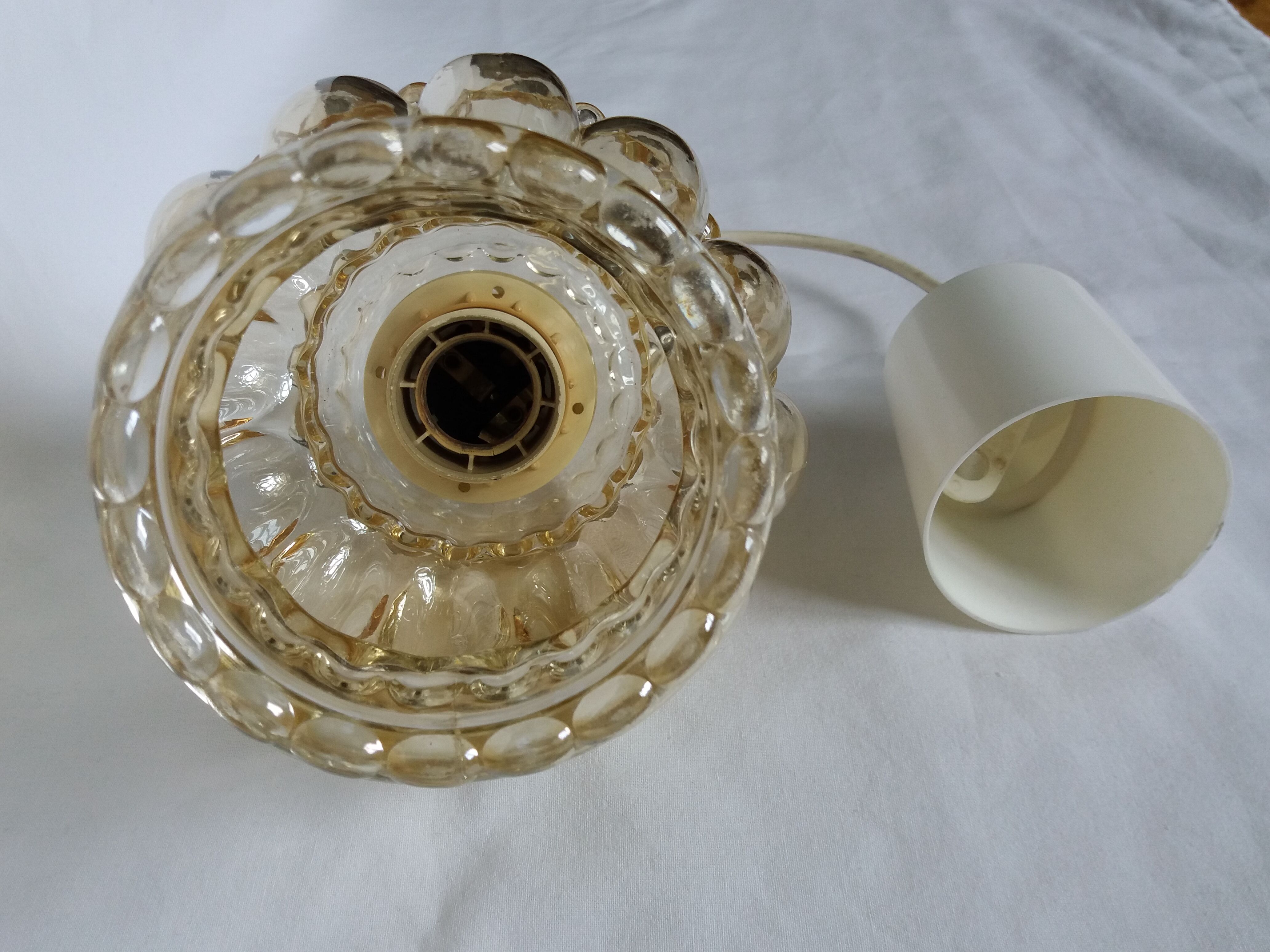 Molded glass globe suspension