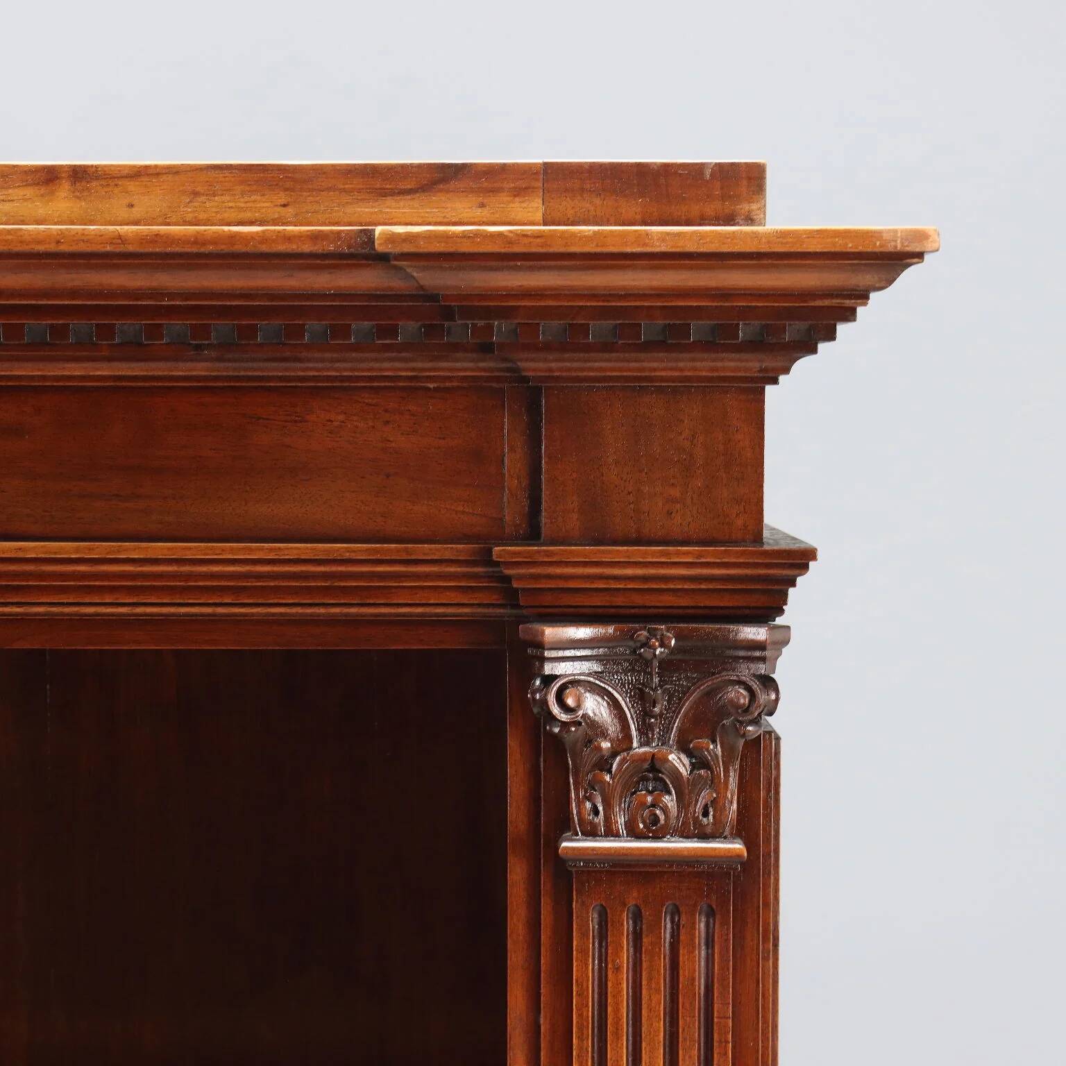 Antique walnut library with Corinthian decorations, 20th century.