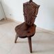 Brutalist tripod chair in carved wood 19th century