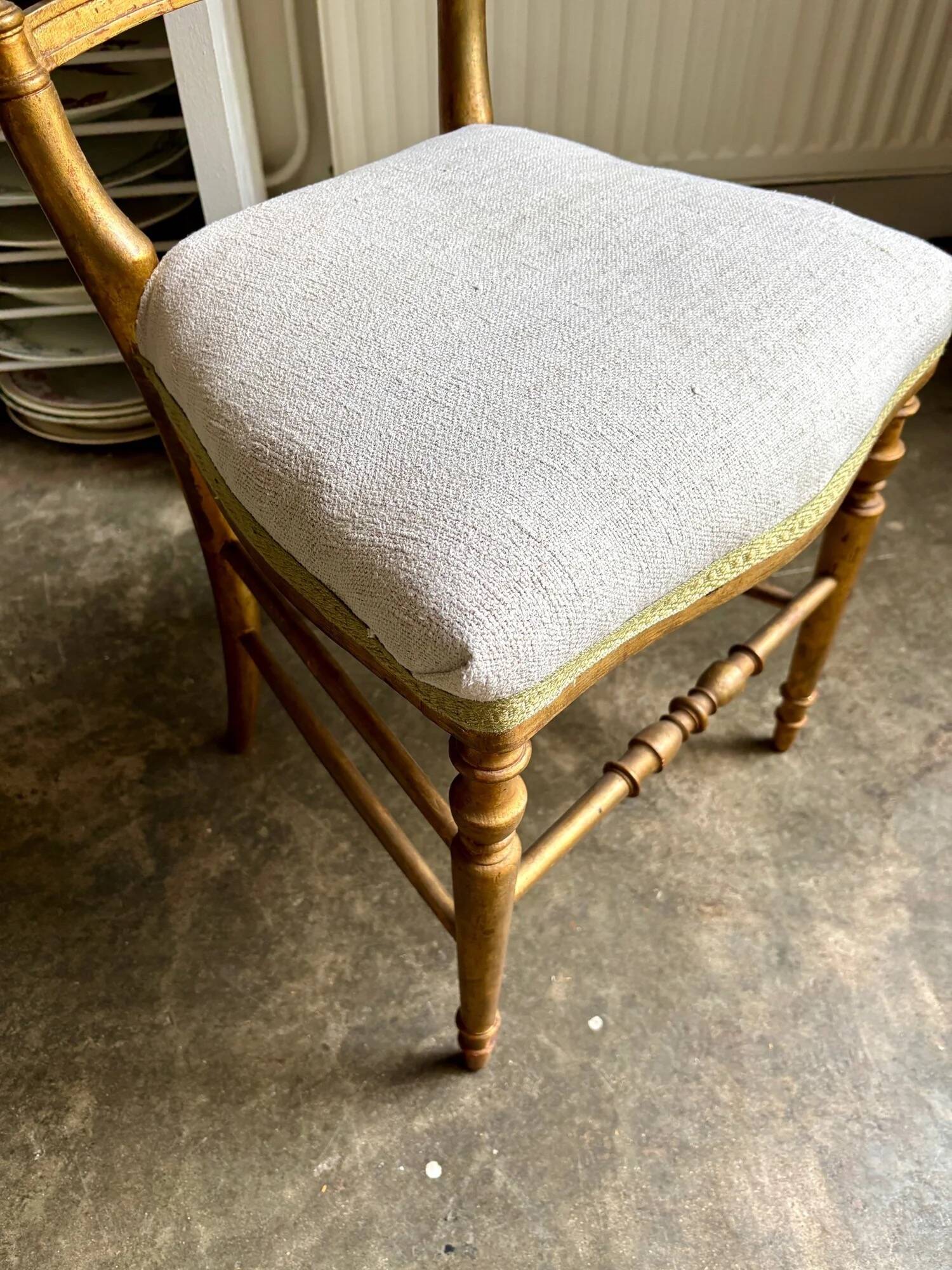 Napoleon III chair in gilded wood and beige cotton