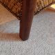 Fauteuil rotin tressé et bois exotique