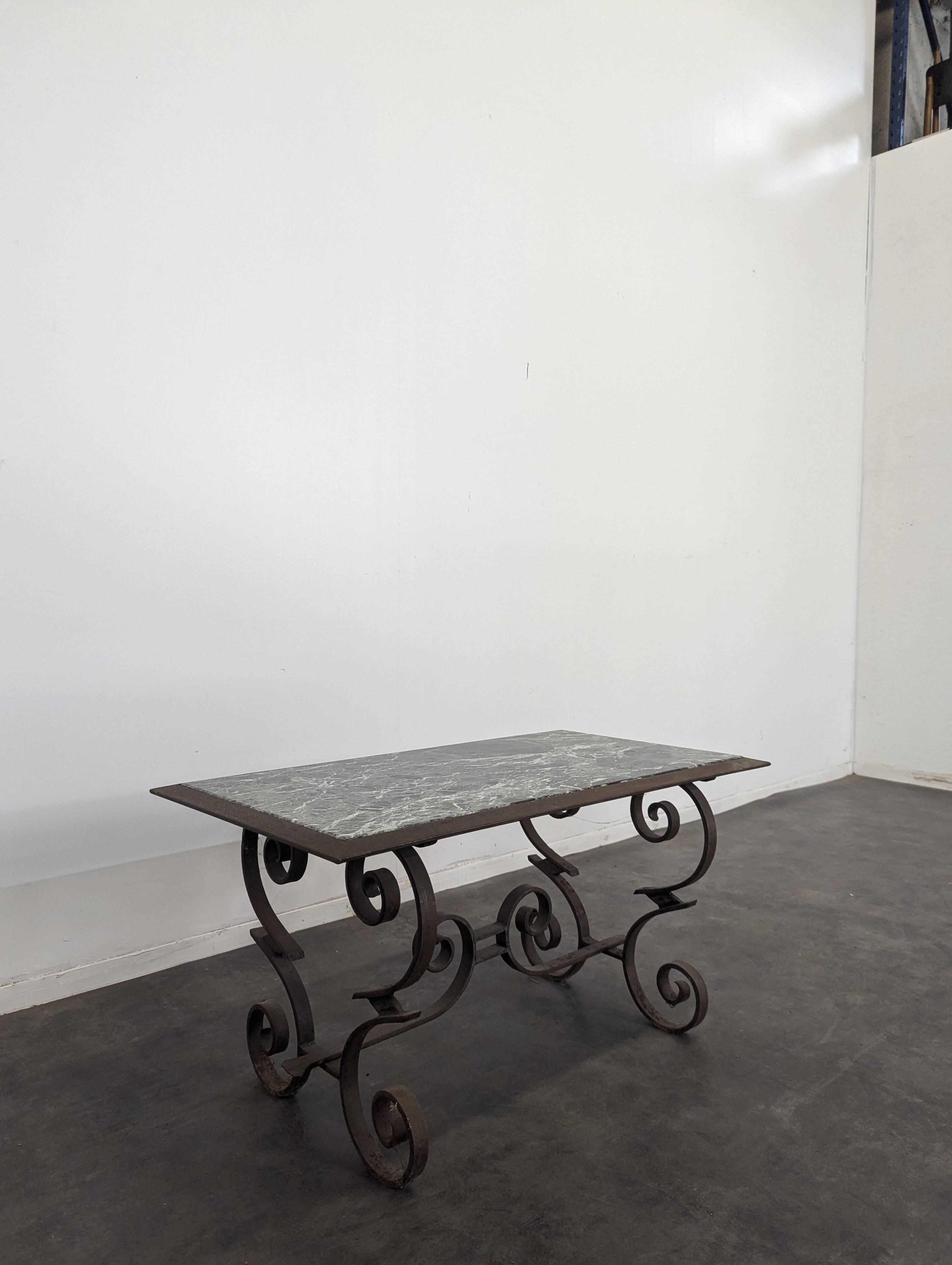 Wrought iron coffee table from the 1900s.