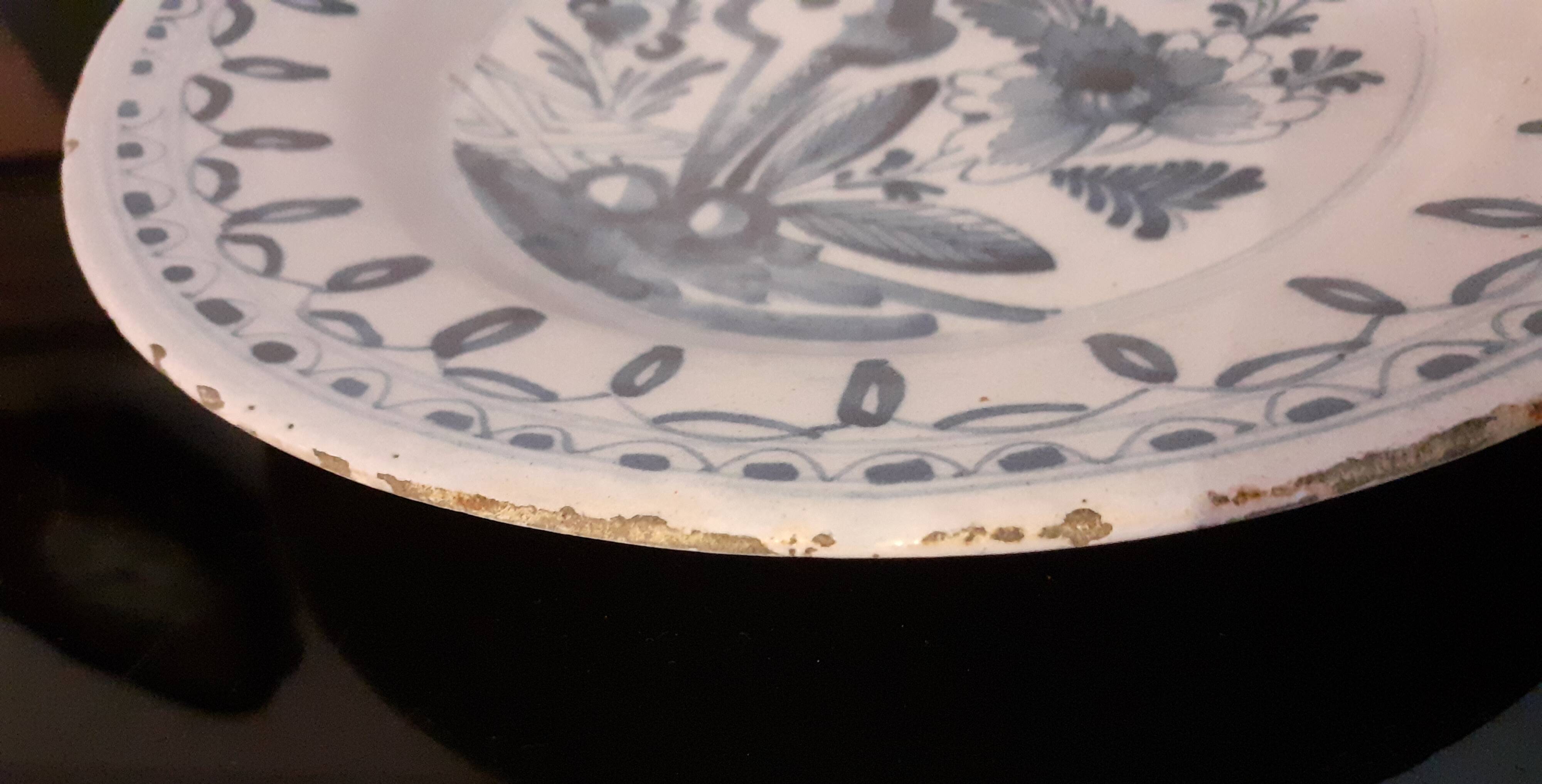 Old enamelled earthenware plate / Blue floral decoration