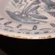 Old enamelled earthenware plate / Blue floral decoration