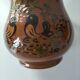 Glazed earthenware pitcher signed HR with a design of stylised birds.