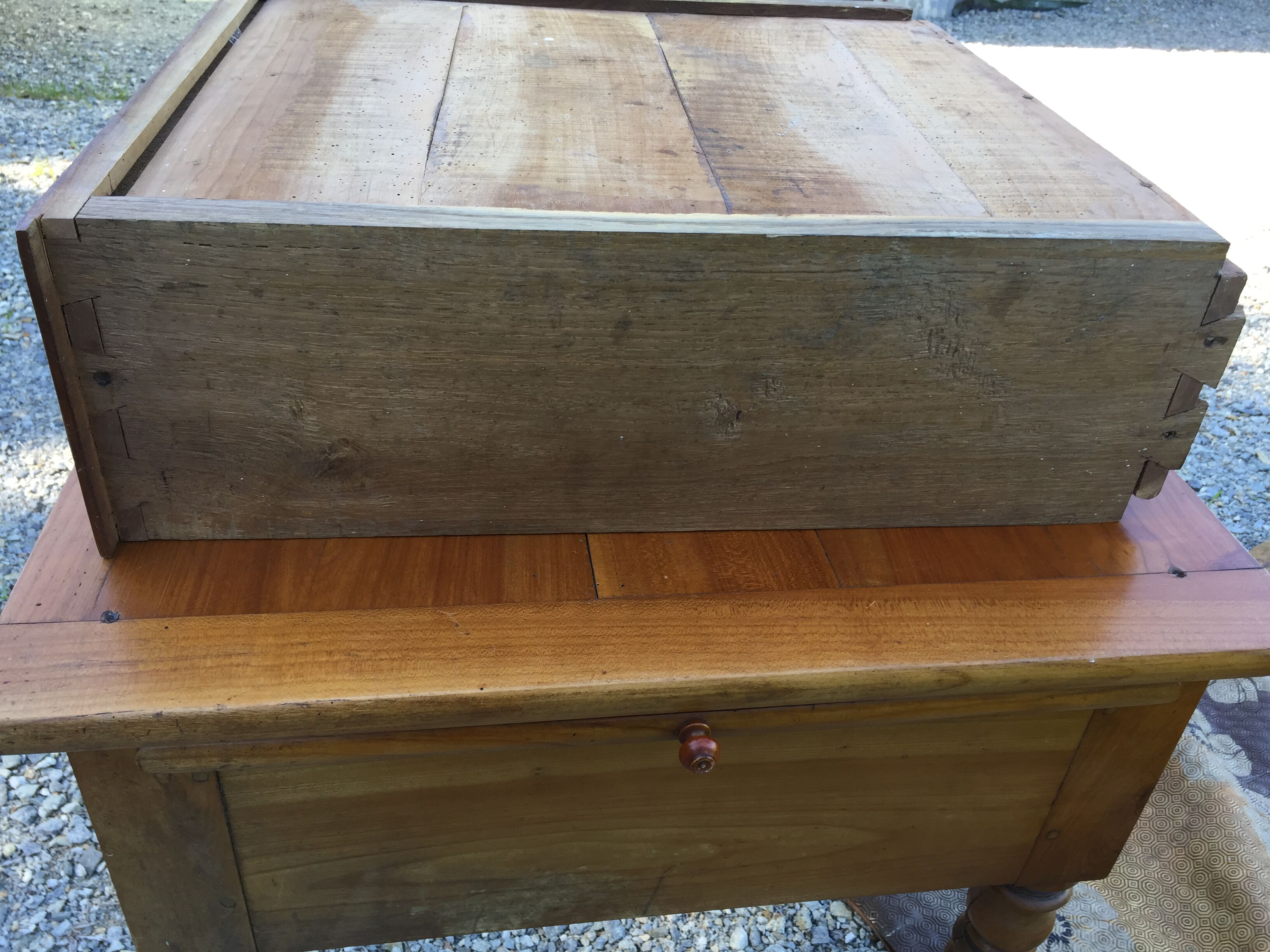 Old farmhouse table louis Philippe style in solid cherry with turned feet.
