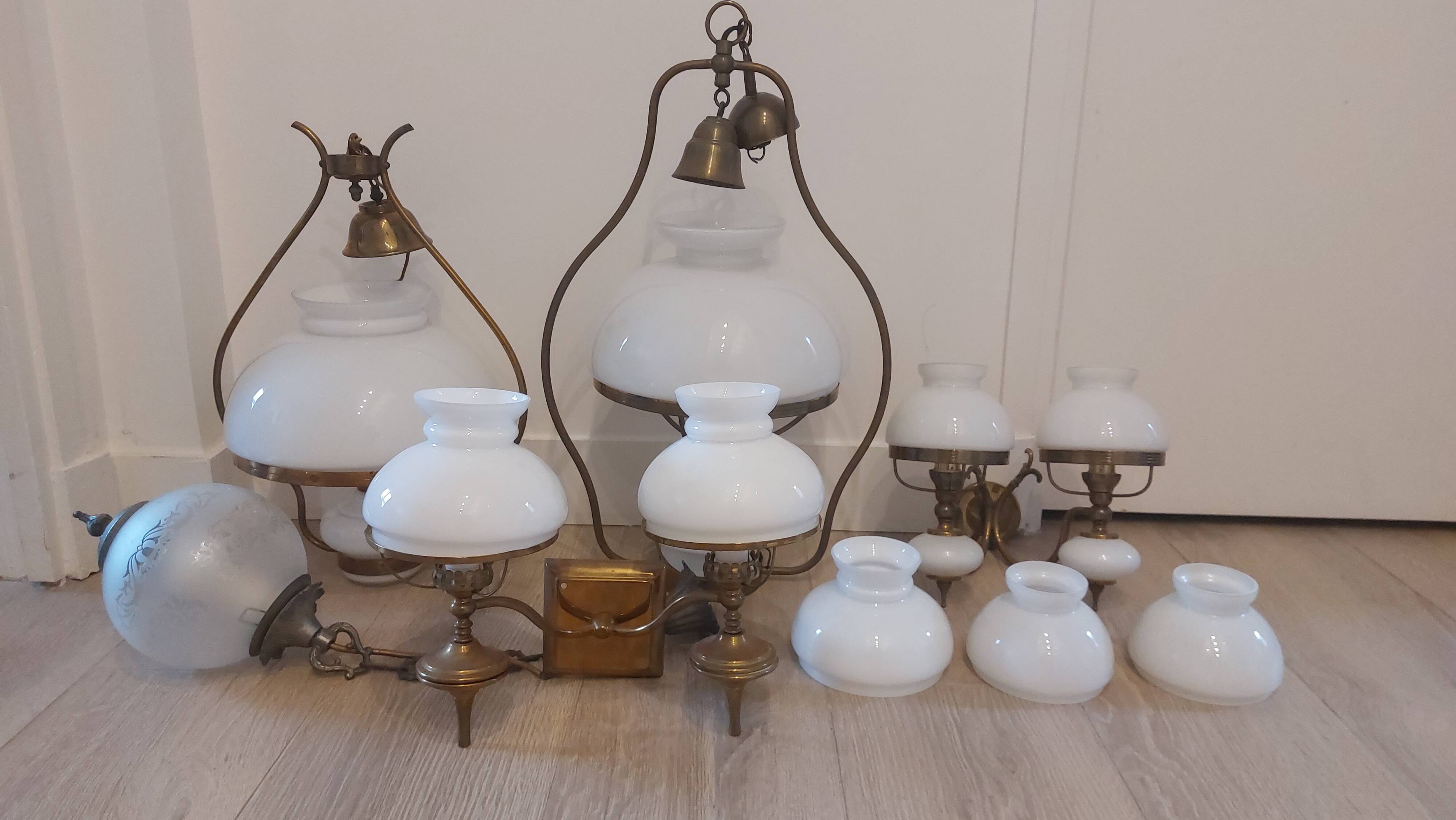 Lots of 1950s copper/ brass suspensions and wall lights with shades.