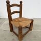 Brutalist chair in wood and straw