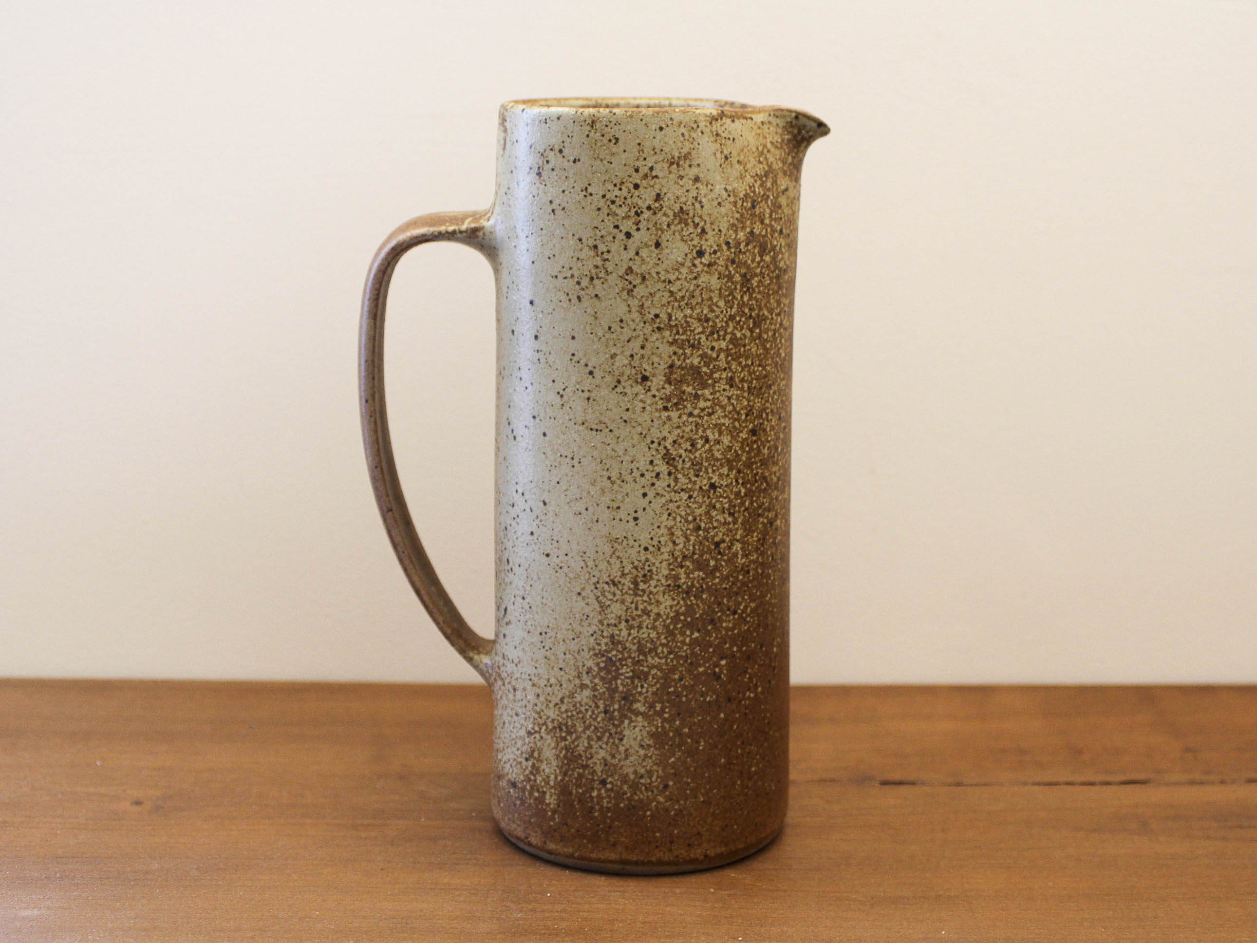 Pitcher in sandstone pyrity signed