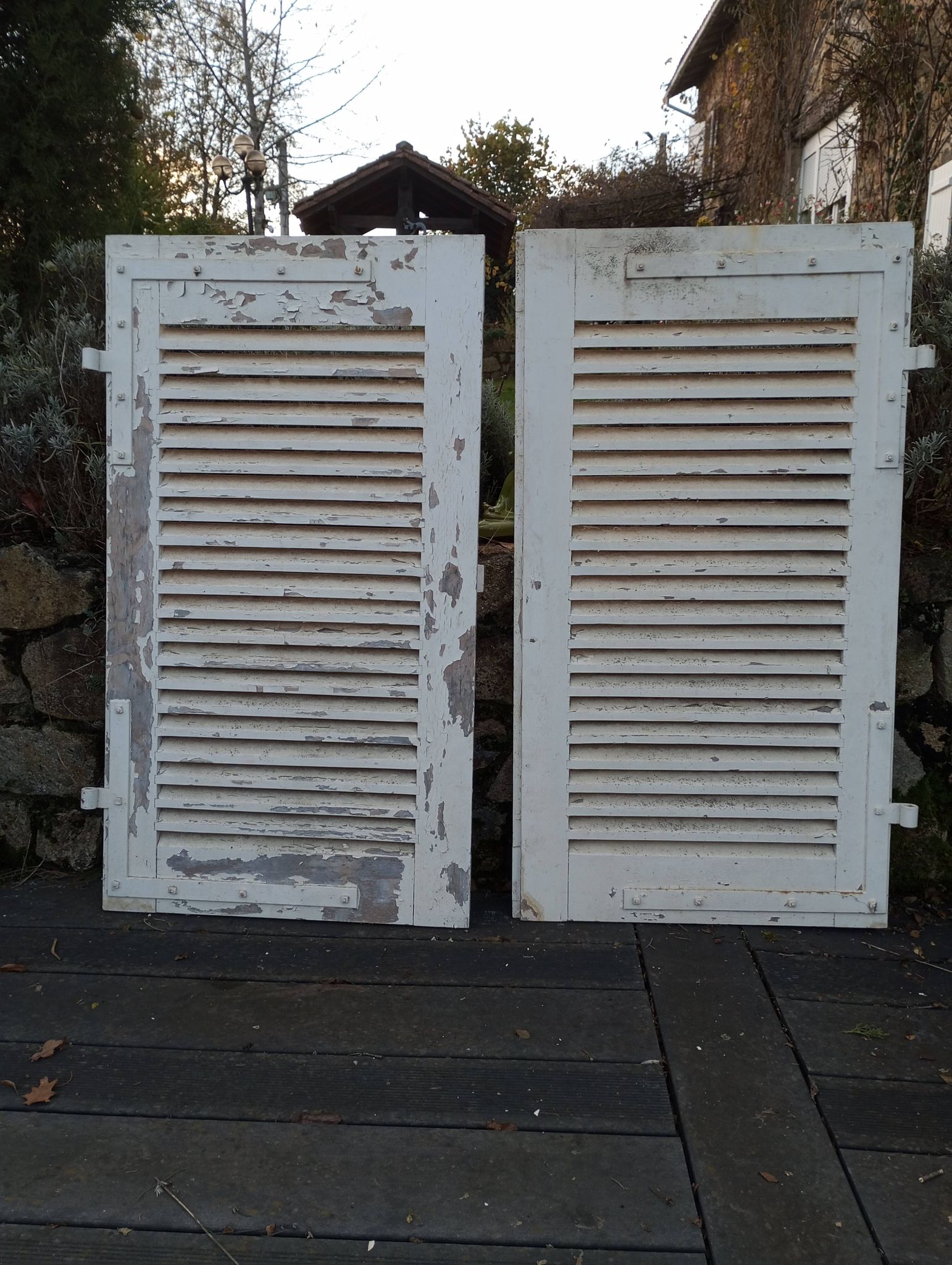 Pair of tropical wood shutters