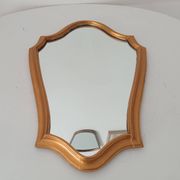 Vintage baroque mirror in gilded wood