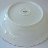 Hollow dish in white porcelain, golden lip.