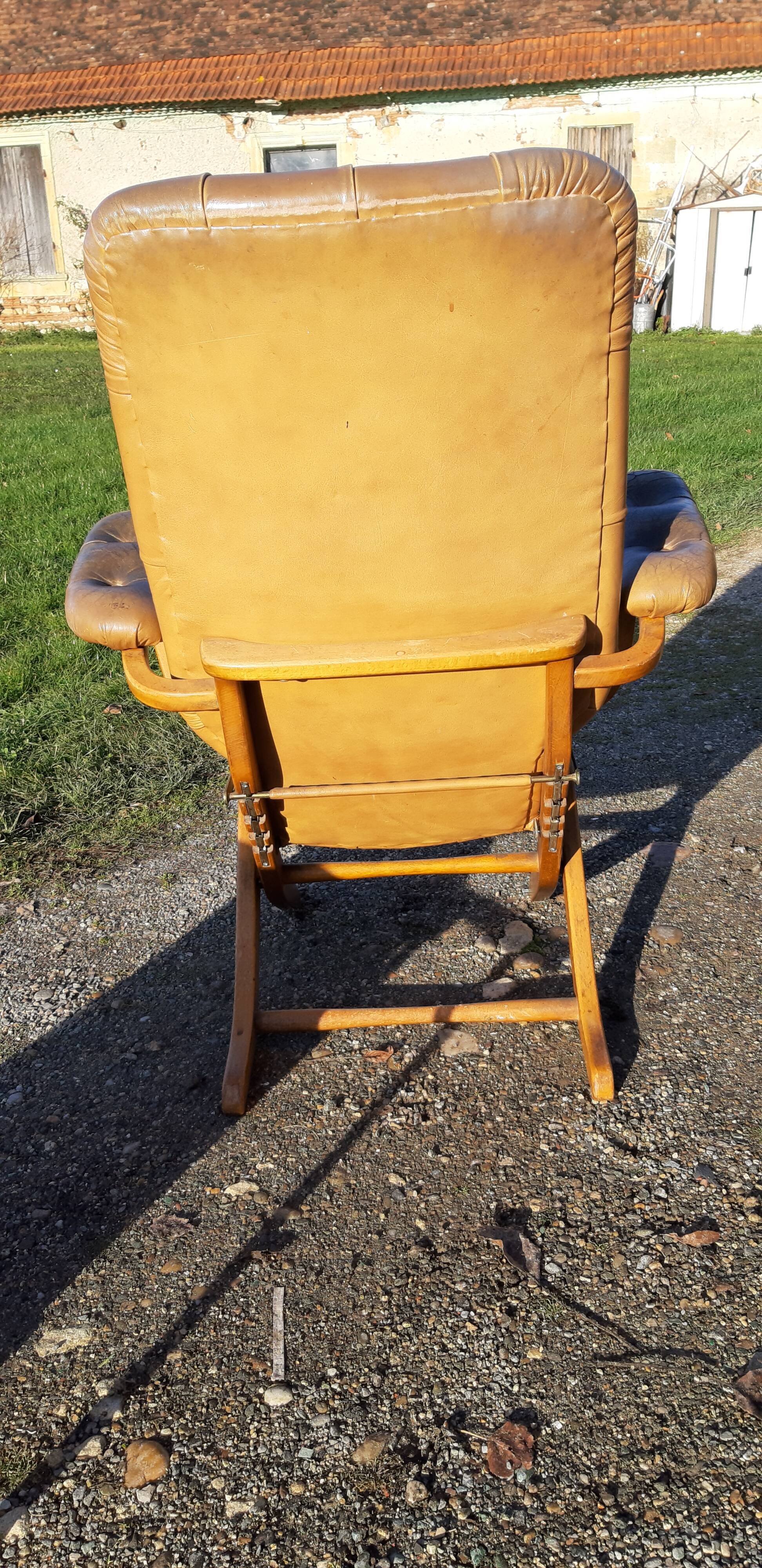 Pair of chesterfield style leather armchairs