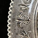 Old plate with pressed glass arabesque pie