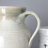 Old decanter in enamelled sandstone