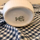 Small old milk jug