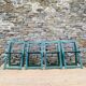 Set of 4 green folding chairs