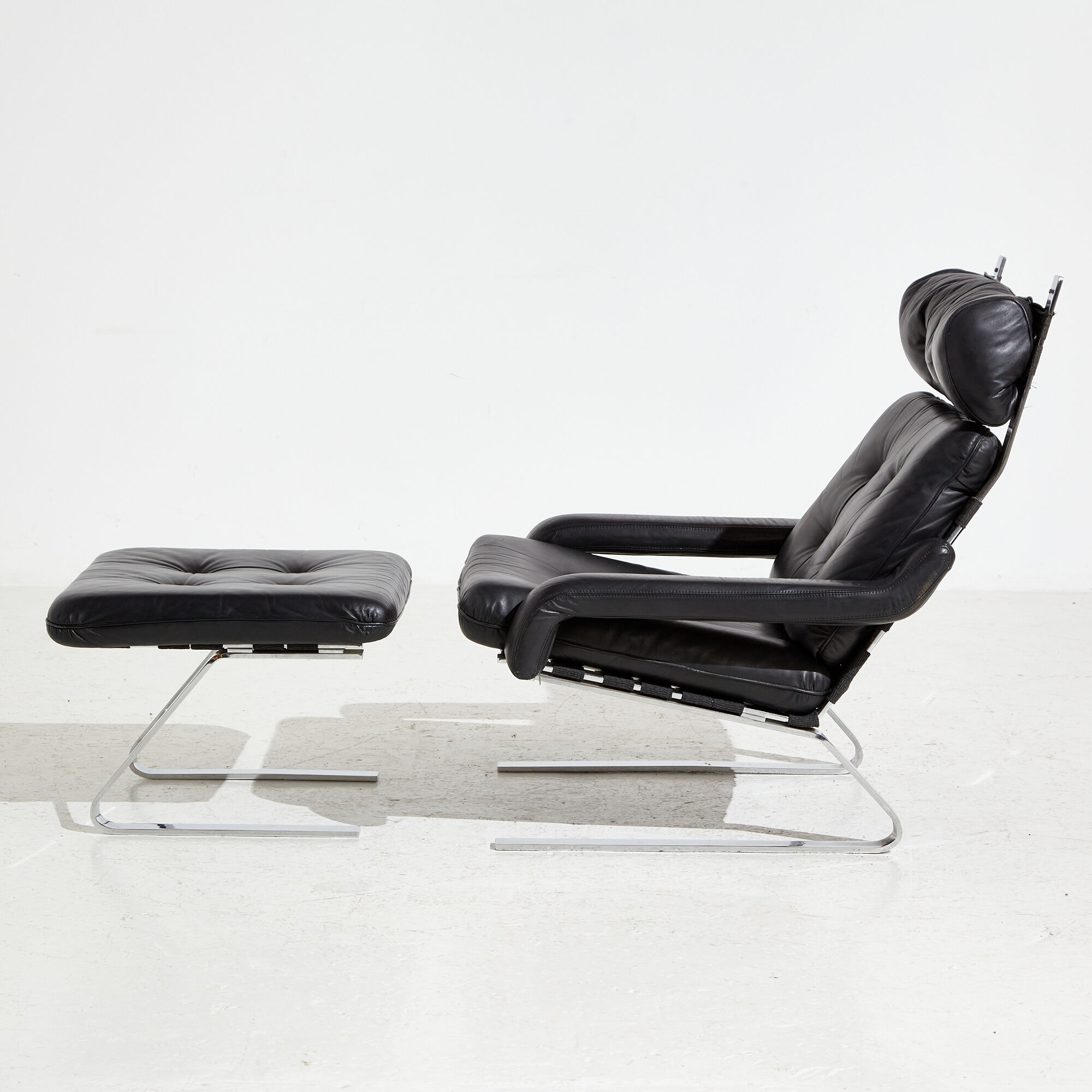 Leather lounge chair with ottoman by reinhold adolf for cor mk9220