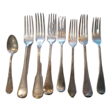 Set of 7 forks and 1 spoon in silver metal