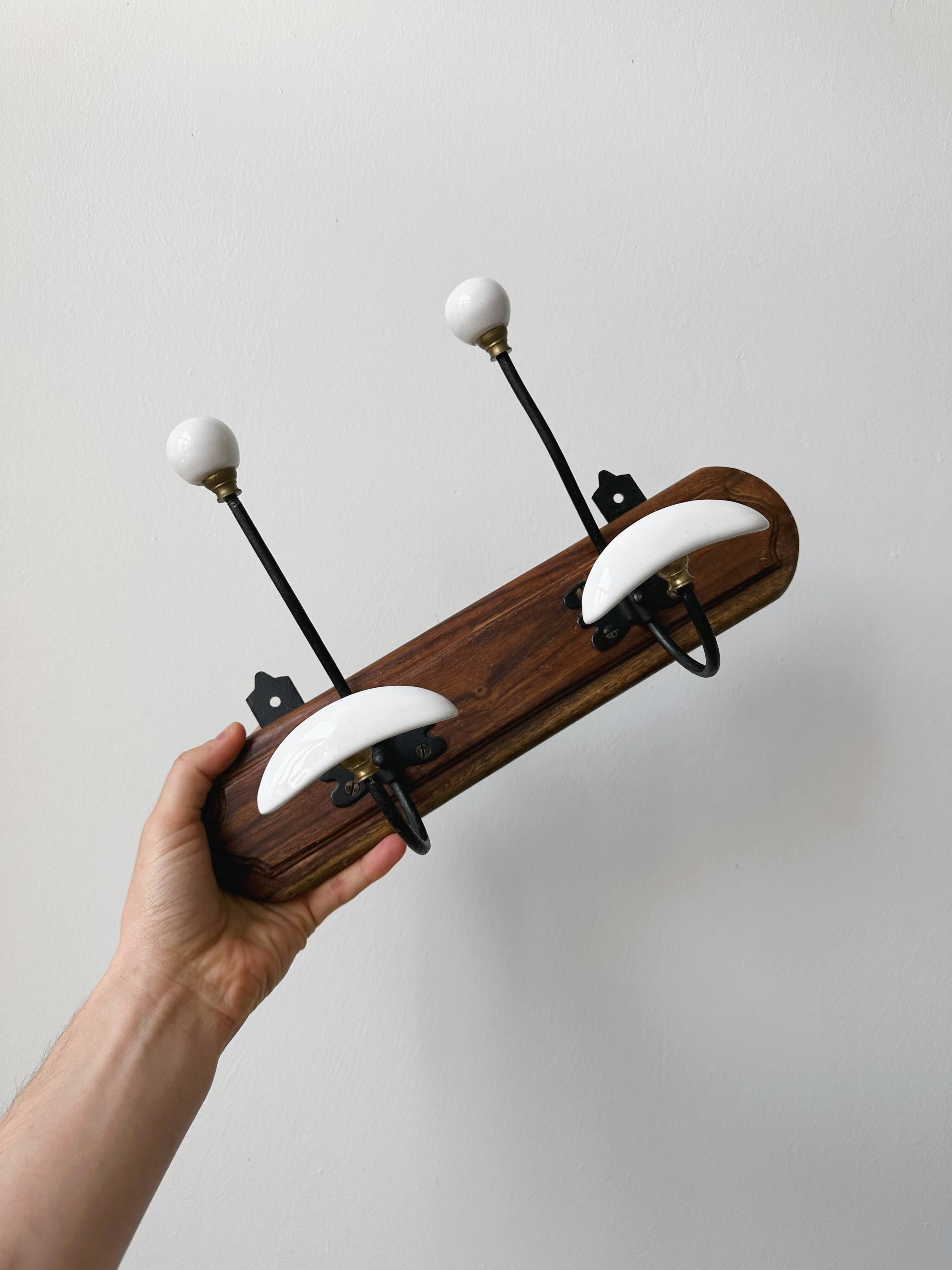 Set of two wooden and porcelain coat hooks