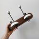 Set of two wooden and porcelain coat hooks