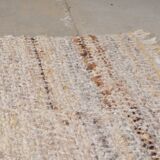 Tapis en laine beige vintage