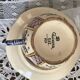 Antique Quimper Henriot earthenware cups and saucers